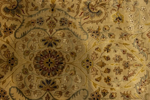 Lot 146 - An Indian ivory ground "Agra" carpet,...