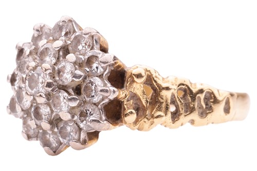 Lot 156 - A Modernist-style diamond cluster ring in 18ct...