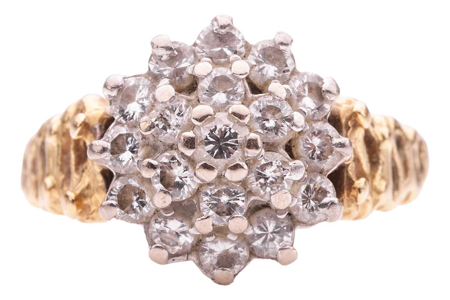 Lot 156 - A Modernist-style diamond cluster ring in 18ct...