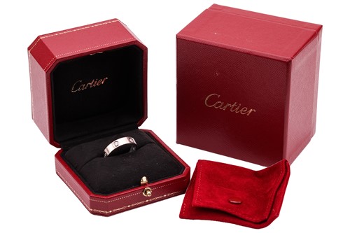 Lot 38 - Cartier - an 18ct white gold 'Love' ring set...
