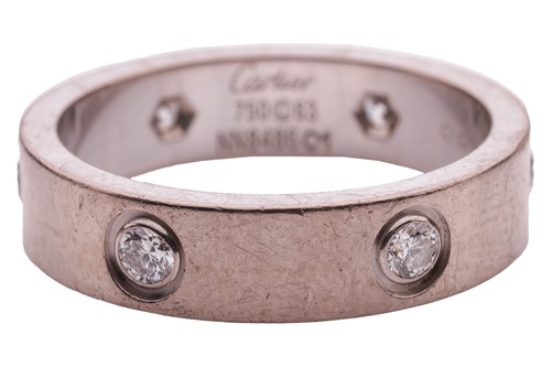 Lot 38 - Cartier - an 18ct white gold 'Love' ring set...