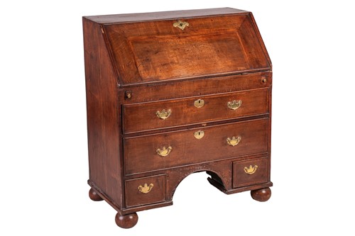 Lot 123 - A George I and later oak writing bureau, the...