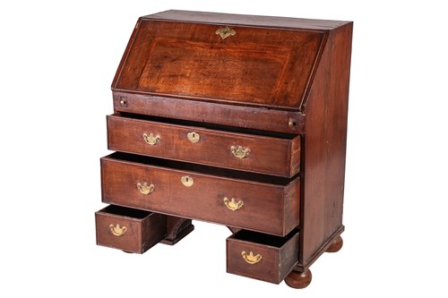 Lot 123 - A George I and later oak writing bureau, the...
