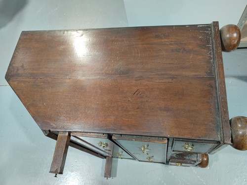 Lot 123 - A George I and later oak writing bureau, the...