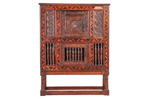 Lot 118 - A part 17th century oak Dole cupboard, with a...