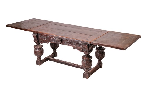 Lot 77 - A part Elizabeth I oak rectangular draw leaf...