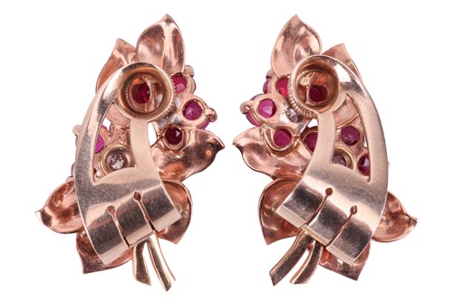 Lot 128 - A pair of floral spray earrings set with a...