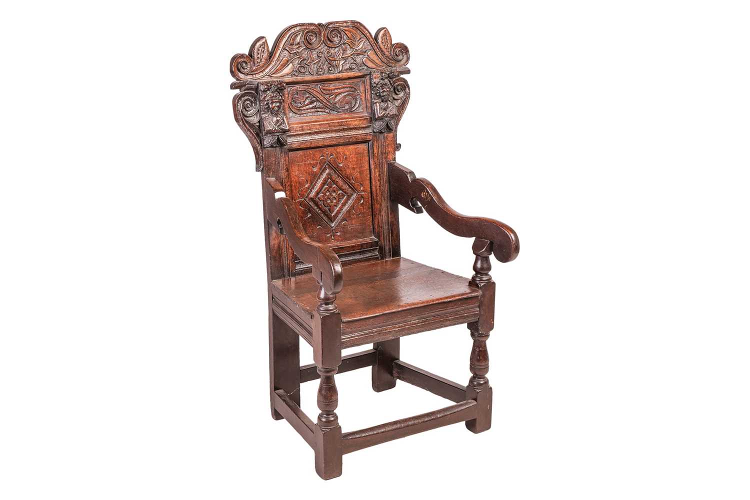 Lot 75 - A Charles II and later oak wainscot armchair...