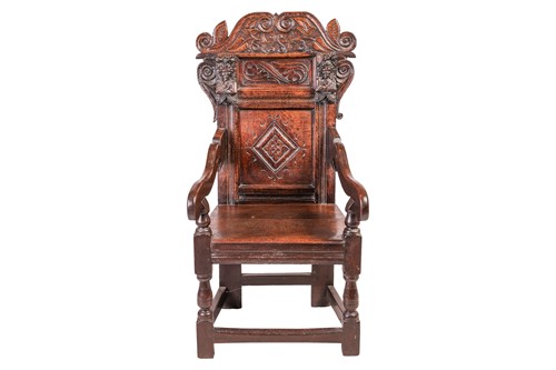 Lot 75 - A Charles II and later oak wainscot armchair...