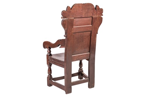 Lot 75 - A Charles II and later oak wainscot armchair...