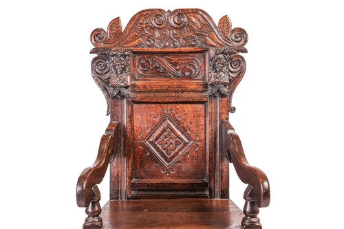 Lot 75 - A Charles II and later oak wainscot armchair...