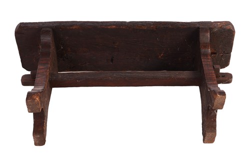 Lot 117 - A primitive vernacular oak/elm form stool,...