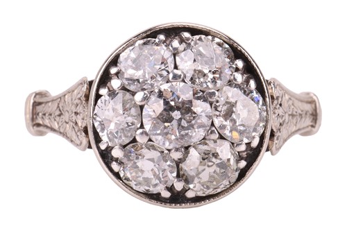 Lot 166 - A diamond cluster dress ring, the circular...
