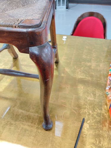 Lot 73 - A Queen Anne red walnut side chair with shaped...