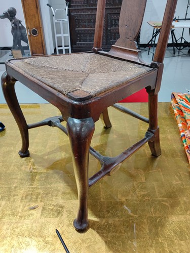 Lot 73 - A Queen Anne red walnut side chair with shaped...