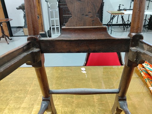 Lot 73 - A Queen Anne red walnut side chair with shaped...