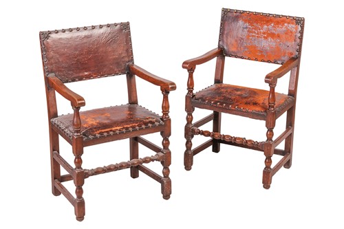 Lot 97 - A set of six Cromwellian-style oak and leather...