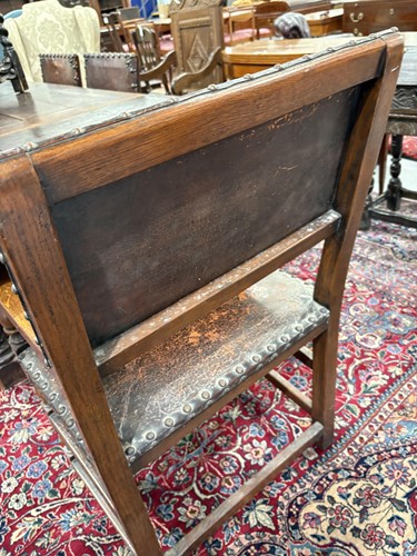 Lot 97 - A set of six Cromwellian-style oak and leather...