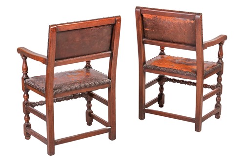 Lot 97 - A set of six Cromwellian-style oak and leather...