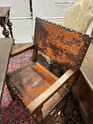 Lot 97 - A set of six Cromwellian-style oak and leather...