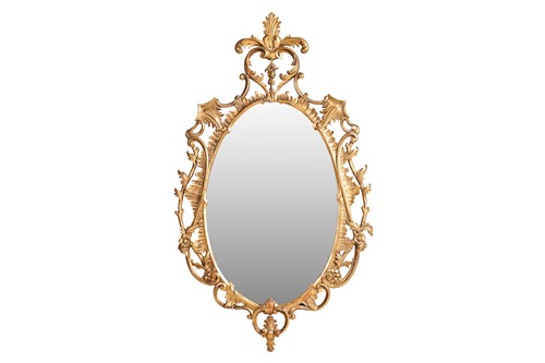 Lot 141 - A 19th-century oval carved wood and gilt gesso...