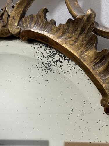 Lot 141 - A 19th-century oval carved wood and gilt gesso...