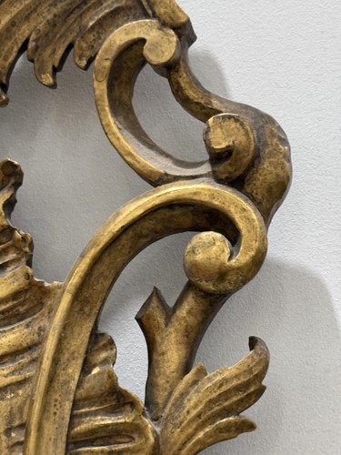 Lot 141 - A 19th-century oval carved wood and gilt gesso...