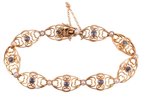 Lot 37 - A panel link bracelet set with split pearl and...