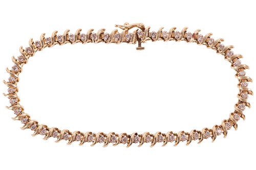 Lot 113 - A diamond line bracelet of spiral design, with...