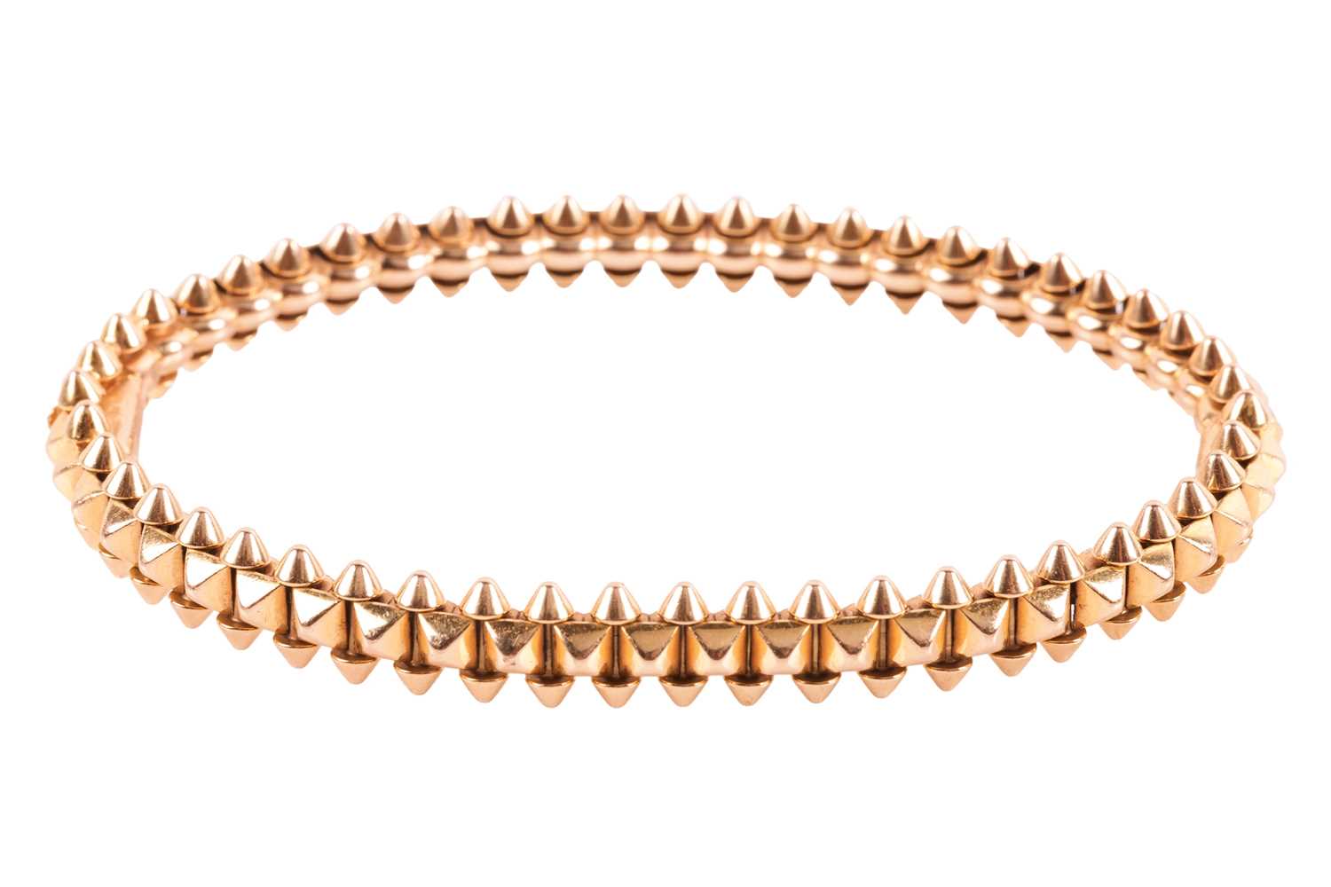 Lot 170 - Cartier - a Clash de Cartier hinged bangle,...