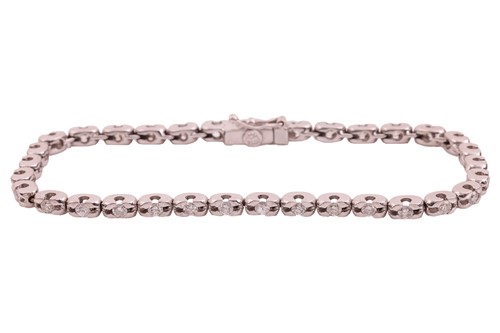 Lot 52 - A diamond line bracelet, comprising a row of...