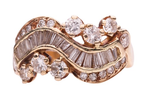Lot 18 - A diamond dress ring of abstract design, set...