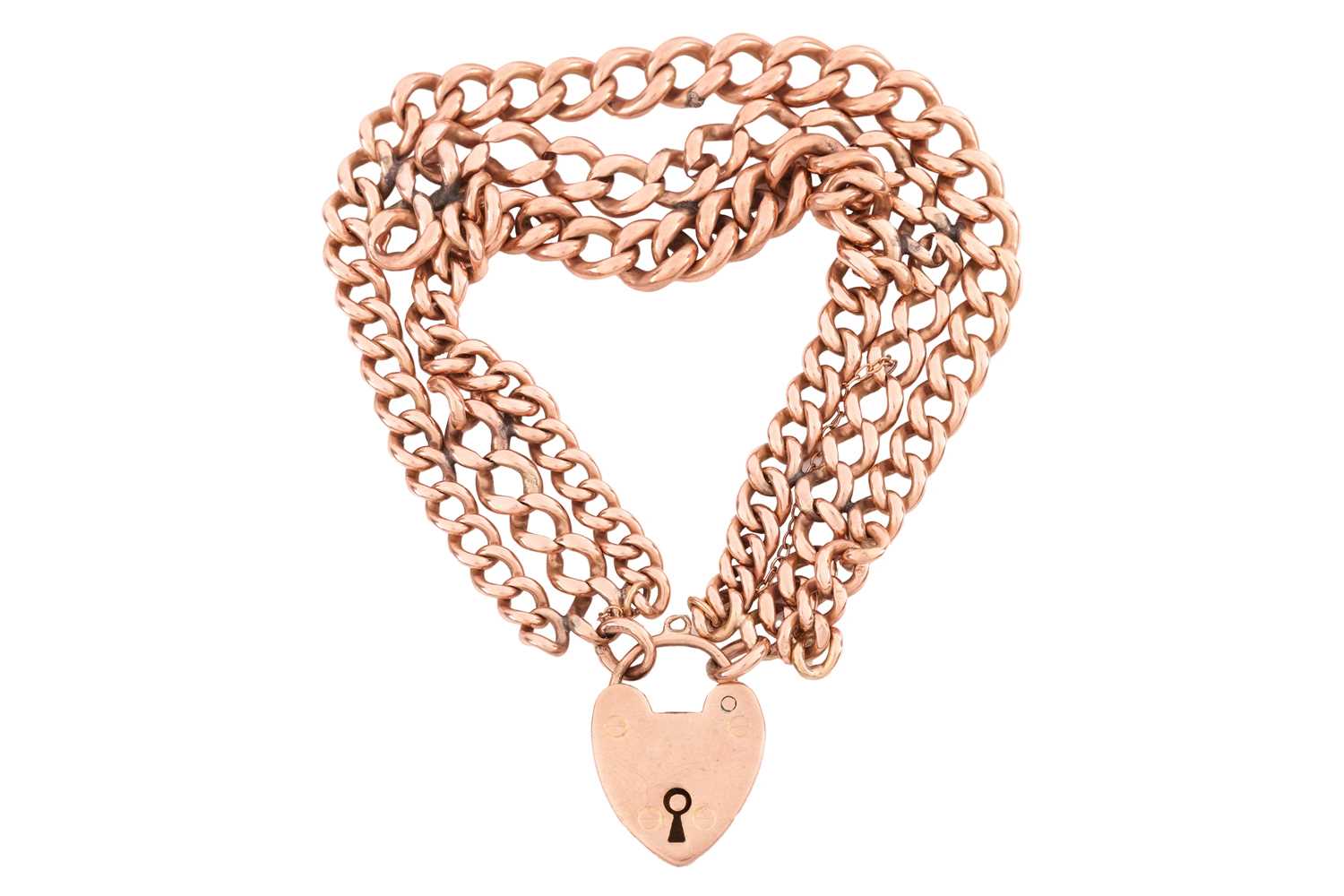 Lot 196 - A triple row bracelet with heart padlock clasp...