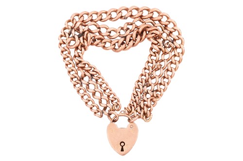 Lot 196 - A triple row bracelet with heart padlock clasp...
