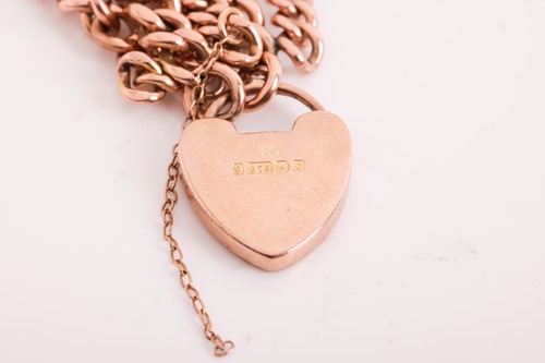 Lot 196 - A triple row bracelet with heart padlock clasp...