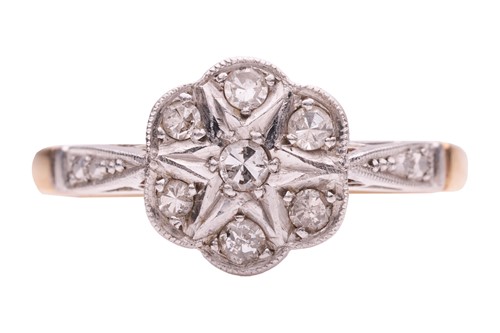 Lot 54 - A diamond ring of floral design, estimated...