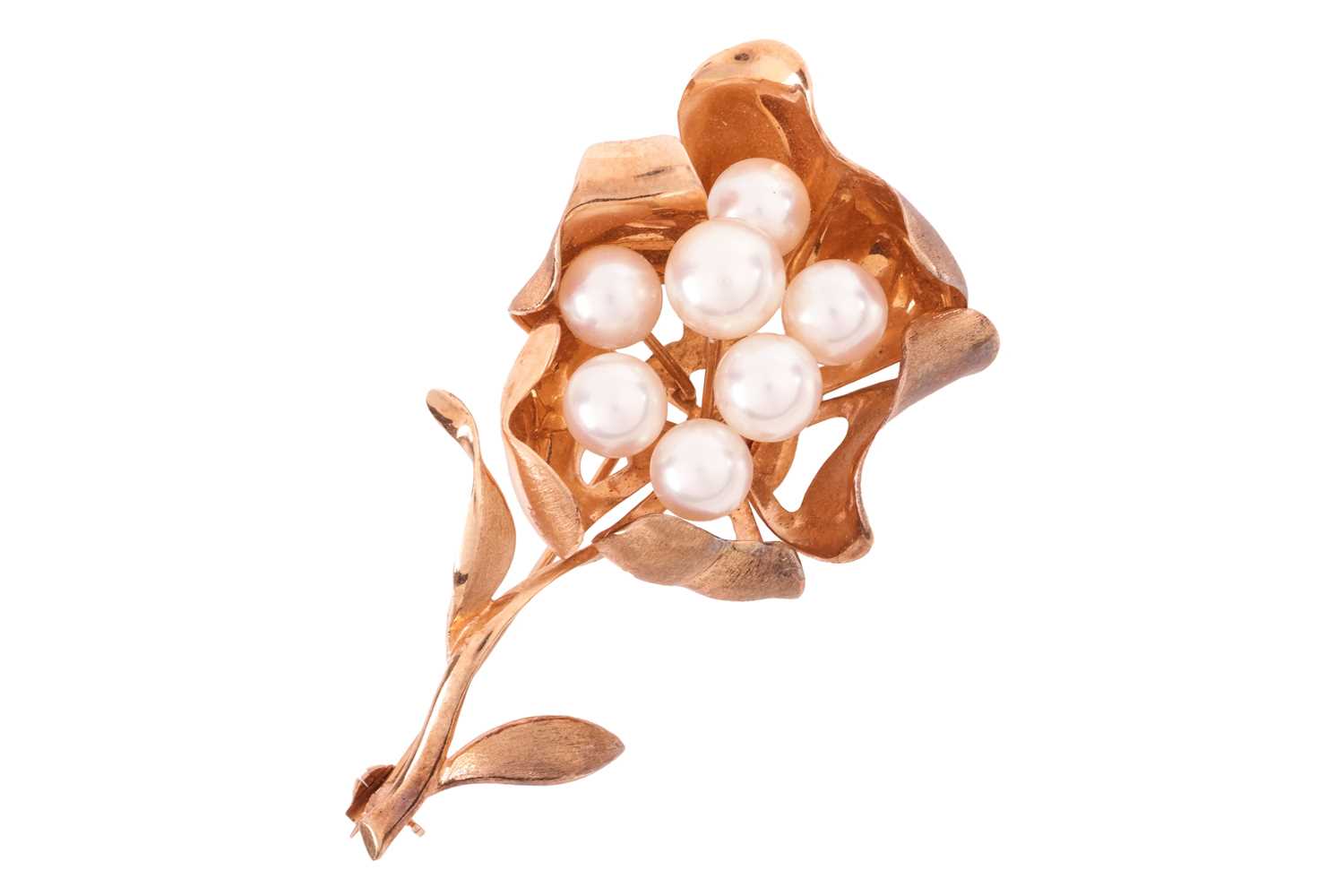 Lot 86 - A pearl-set floral brooch, of a stylised...