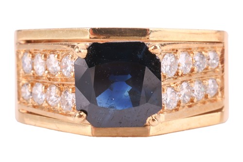 Lot 72 - A sapphire and diamond dress ring, claw set...