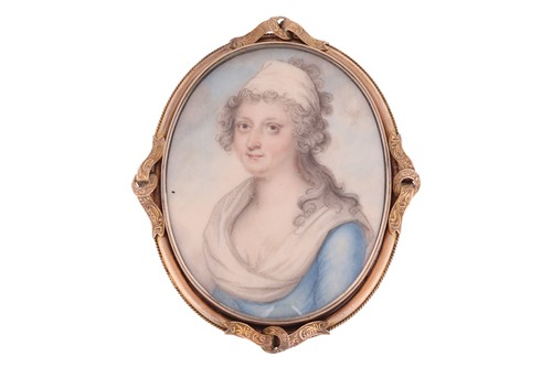 Lot 120 - A large Victorian ivory portrait brooch; the...