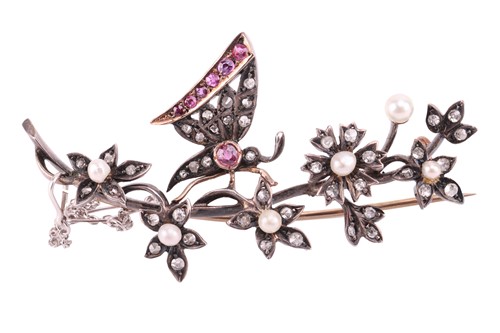 Lot 209 - A Victorian gem-set floral brooch, depicting a...