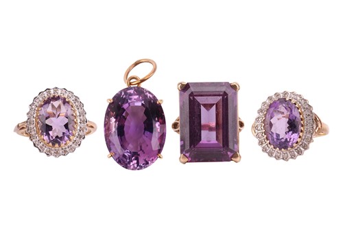 Lot 202 - Three gem-set rings and one amethyst pendant;...