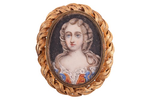 Lot 98 - A late 18th-century ivory portrait brooch in...