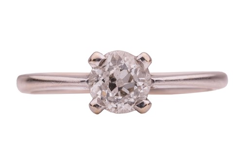 Lot 147 - A diamond solitaire ring, claw set with an old-...