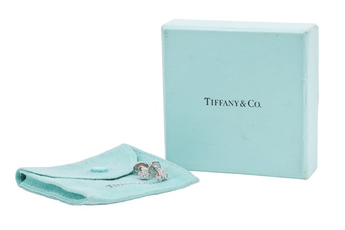Lot 43 - Tiffany & Co. - a pair of diamond cluster...