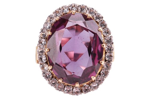 Lot 203 - A gem-set dress ring, featuring a synthetic...