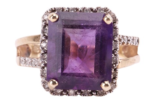 Lot 187 - An amethyst and diamond dress ring, a step-cut...