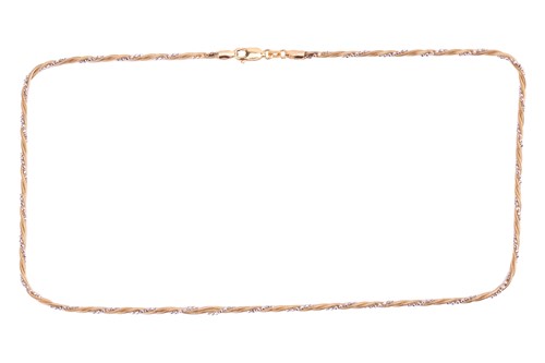 Lot 101 - A two-tone twisted rope necklace in 9ct gold,...