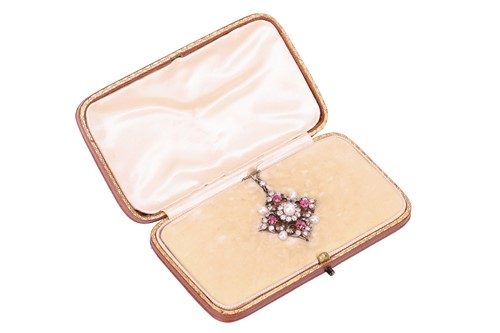 Lot 167 - A diamond, ruby and natural pearl pendant on...