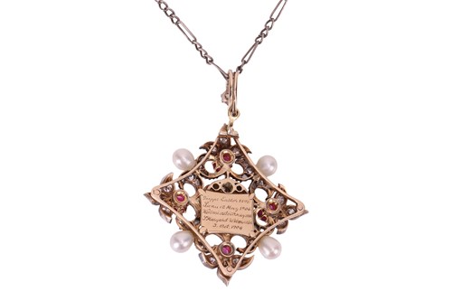 Lot 167 - A diamond, ruby and natural pearl pendant on...