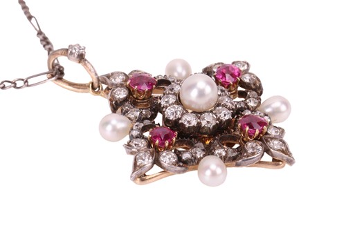 Lot 167 - A diamond, ruby and natural pearl pendant on...